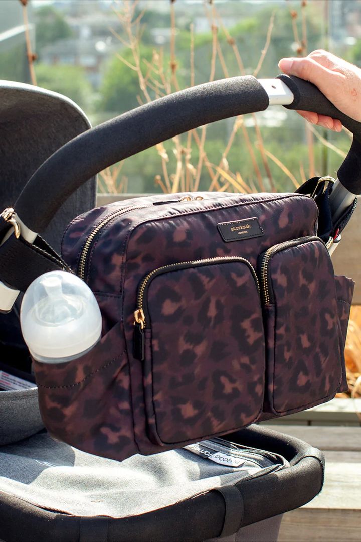 Storksak 2 in 1 Kinderwagen Organizer und Schultertsche mit Leoprint