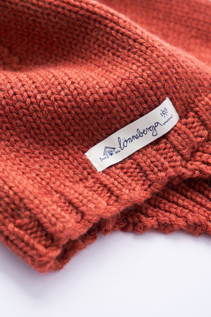 Knitted Hat with Earflaps in Merino Wool rust