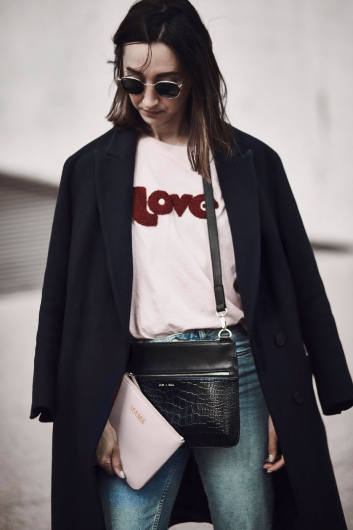 Crossbody diaper bag with a crocodile look made of leather, black